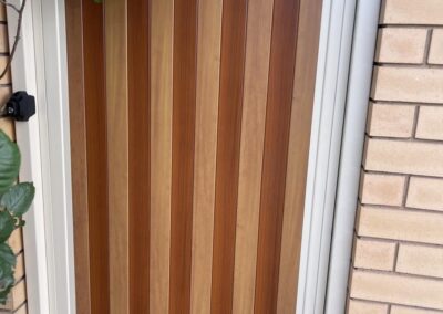 Hermitage Design Decowood Timber Look Aluminium Gate with alternating decowood colours with classic cream frame