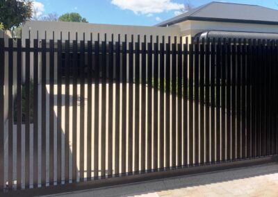 Custom Marden Design Sliding Gate with Angle as Battens and tops cut