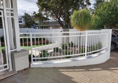 Contoured Custom Fencing in Semaphore Design Satin White